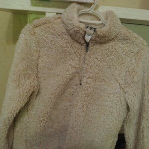 Serpa type pull over cream colored almost white